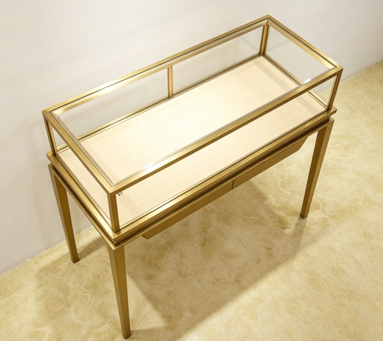 Luxury Champagne Gold Tall Pedestal Jewelry Display Case with LED Lighting Lockable Glass Top Modern Museum Style