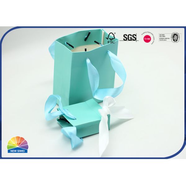 Слоение сумки подарка бумаги цвета Patone штейновое с голубой ручкой шелка