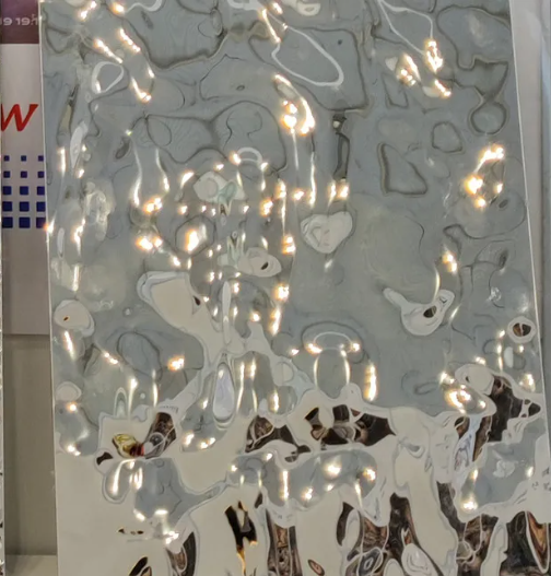 Premium 304 titanium gold water wave steel panel for luxury decoration.