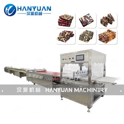 Machine à découper les gâteaux de dattes et de grains de mangue