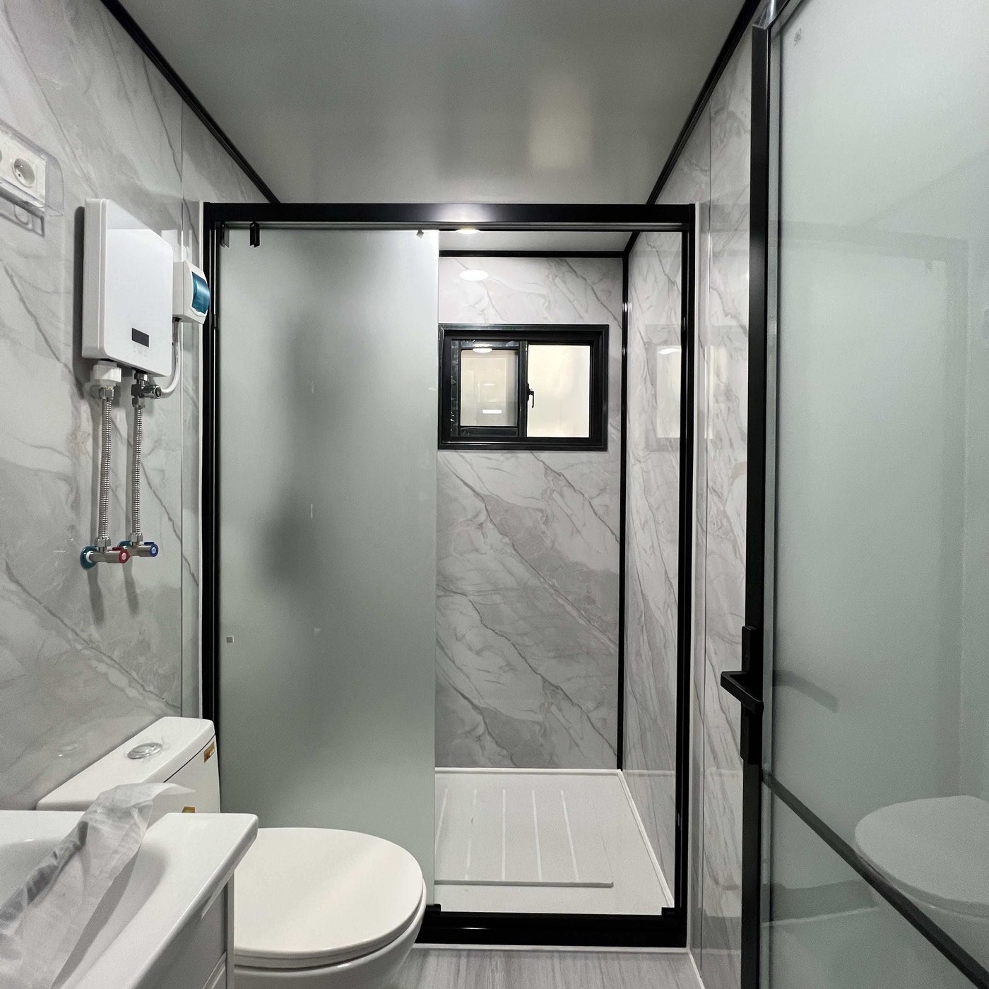 20ft Expandable Container House with Grey Cladding, Black Frame and Fitted Interior