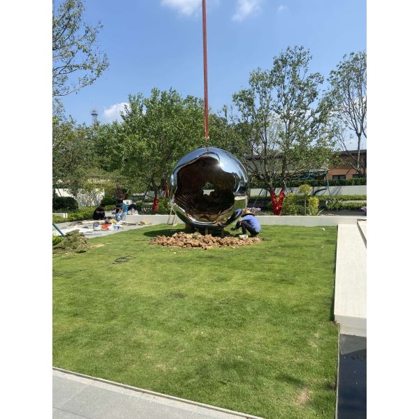 Outdoor garden at night large abstract sculpture LED lights with light wave changes welcome custom sculpture