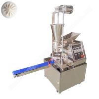 La machine automatique de fabrication de petits bonbons Momo est une machine de fabrication de bonbons Baozi