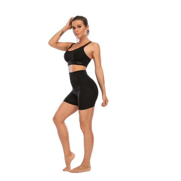 Três fileiras engancham o corpo que dá forma às calças XXL 3XL da ioga que dão forma a caneleiras do exercício