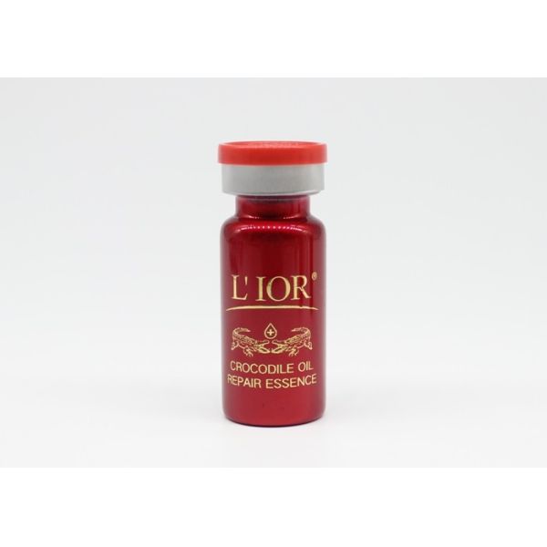 Фармацевтическая или косметическая небольшая стеклянная бутылка