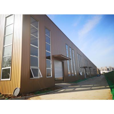 現代のガラスカーテン壁 アパート プリファブリックハウス メタル建設 倉庫 倉庫 軽鋼構造 ショッピングモール用建物