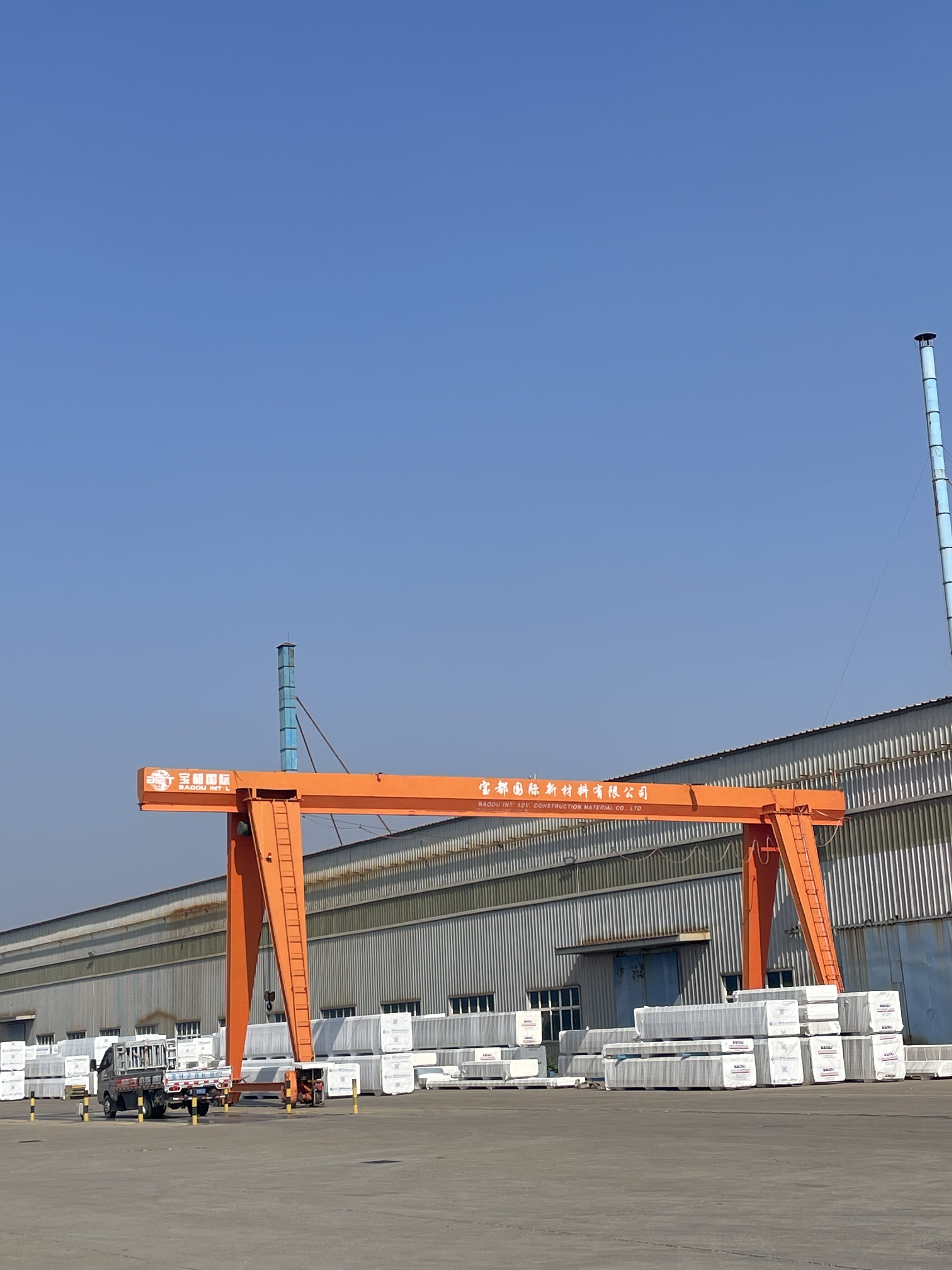 Prefabricated bolt‑assembled steel‑frame building industrial workshop logistics warehouse plant with crane beam mezzanine floor skylight and drainage system for industrial construction