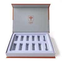 Le cadeau élégant orange de boîte de beauté a placé les insertions en verre faites sur commande de porte-bouteilles