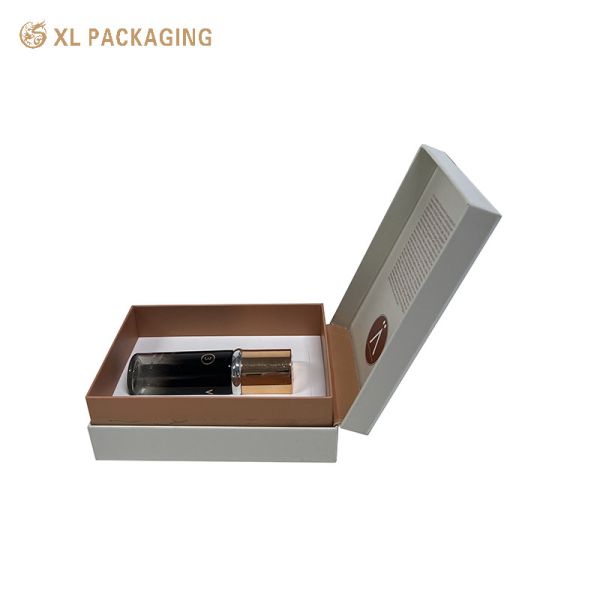 Caixa de papel cosmético em relevo de folha de ouro rosa para garrafa de cuidados com a pele