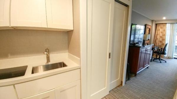 Mukdahan hotel style apartment furniture cherry wood bed with TV cabinet tables and in wall wardrobe closet