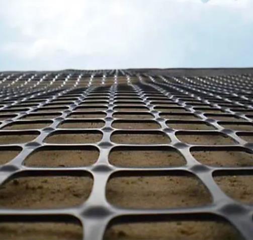 65x65mm PP expulsou a malha biaxiaa 30/30kn da parede de retenção de Geogrid da fibra de vidro