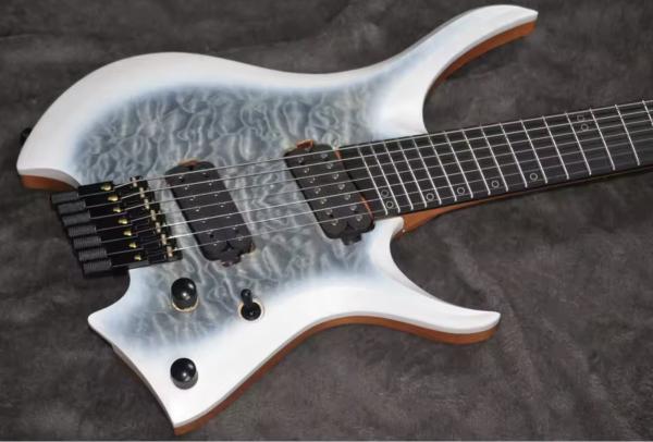 2025 Fanned Frets 7 Strings Headless Electric Guitar White Color with Eye Poplar 5-ply Roasted Maple
