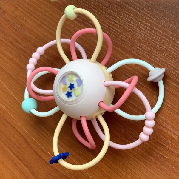 Игрушка шарика самосхвата руки предыдущего образования силикона качества еды игрушки шарика самосхвата руки силикона головоломки младенца вокальная