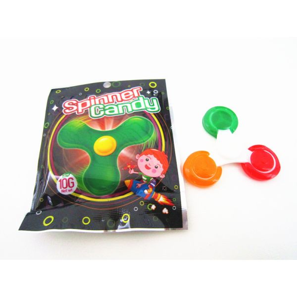 Помадки пасхи хеллоуина покрасили низкий леденец на палочке Cal с игрушкой обтекателя втулки пальца