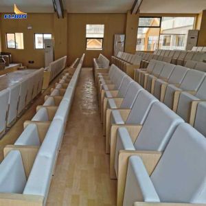 Construire des sièges de théâtre de qualité commerciale avec une capacité de 500 lb et un design ergonomique pour les auditoriums