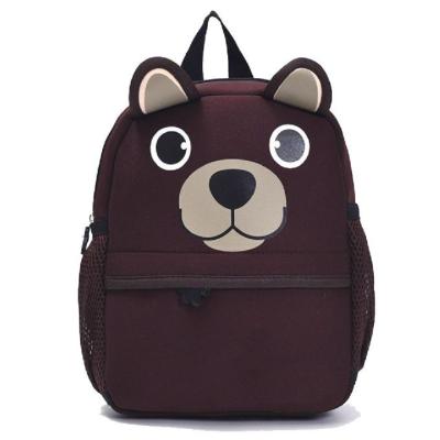 Saco de escola primária pequeno das crianças coloridas com aparência bonito do urso