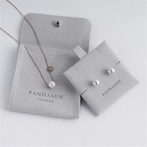 custom embossed suede microfiber jewelry pouch with insert card pads custom logo