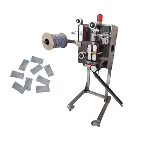 Forte compatibilité pour différentes spécifications de bouteilles et de sacs avec la machine d'insertion de déshydratant Changsheng