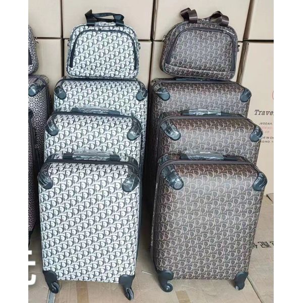 Большой мелкий кожаный чемодан с многогранной антиобувкой с четырьмя колесами