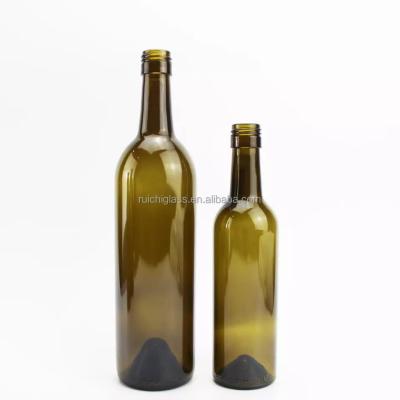 Manuseio da superfície Estampagem a quente Logotipo personalizado 500ml 750ml Garrafa de vidro de vinho