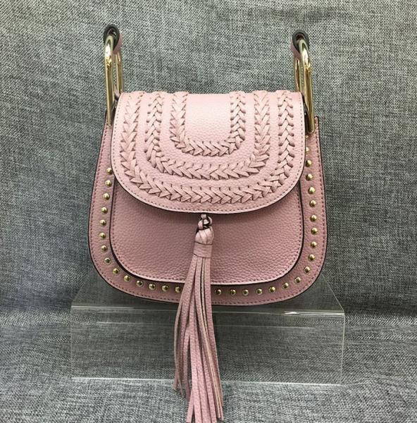 Female head layer of leather 2016 new European and American fashion rivet fringed shoulder bag Messenger packet