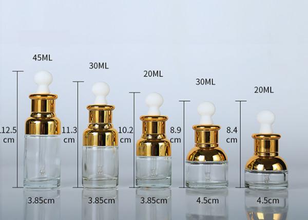 Bouteilles en verre cosmétiques transparentes, couvercle cosmétique d'or de bouteille de jet
