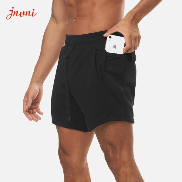 O Activewear dos homens Squatting do halterofilismo assenta o short do exercício do Gym com bolso