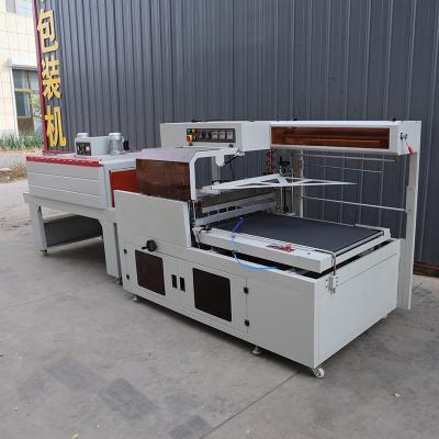 Heat Shrink Industrial Plastic Wrap Packaging Machine Fully Automatic PLC Controlled