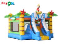 Castillo de salto inflable de la palmera con la diapositiva tropical del muchacho de la resaca