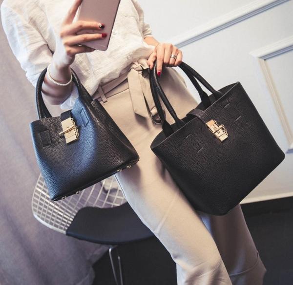 2016 spring new European and American fashion buckle embossed leather shoulder bag women tassel pearl pendant