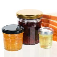 Petits pots en verre étanches à la maçonnerie, empilés pour le stockage de confiture de miel et d'épices