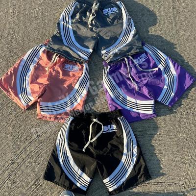 Logo personnalisé Coureurs de haute qualité Polyester léger Cargo Spandex Gym Sports Windbreak Shorts 100% Nylon Shorts rayés