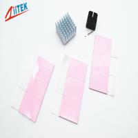Almofada condutora térmica TIF140-15E do emissor de isofrequência do silicone da condutibilidade do rosa 1.5w do dissipador de calor do processador central para caixas superiores ajustadas 