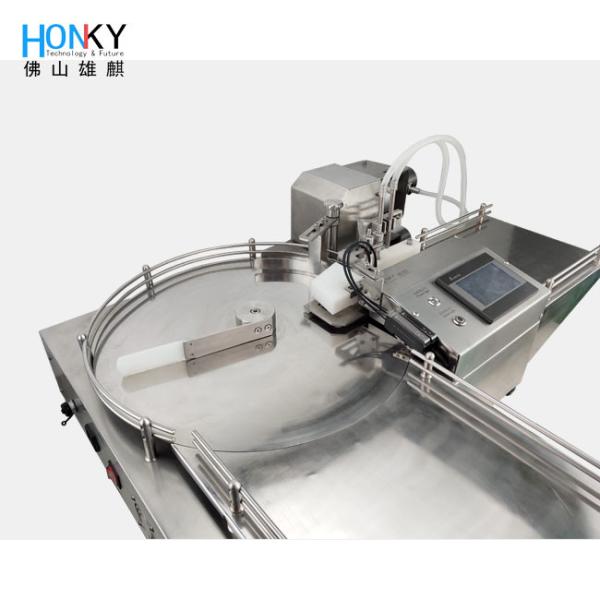 Machine de remplissage de bouteilles rondes de bureau avec système de remplissage à double tête pour le remplissage essentiel de liquide d'huile