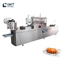 Ligne de production de sacs à saucisses Machine d'emballage sous vide à film étirable automatique