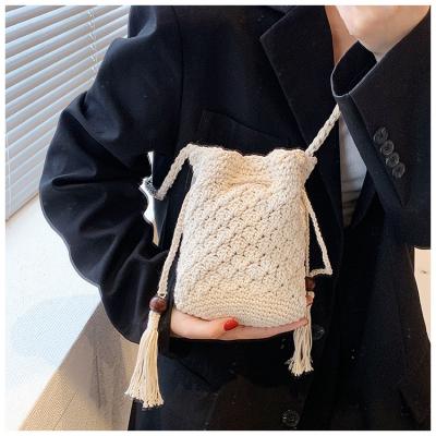 Hot Sale Women Hollow Out Crochet Knit Summer Handbags Straw Woven Portable Raffia Beach Holiday Tote Bag Raffia Paper Rope Crochet Straw Bag for Seaside Vacation Trips Shopping and Shopping