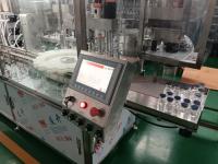 Machine de remplissage de liquide stérile pour les bouteilles en verre et en plastique de 30 à 500 ml avec protection contre l'azote pour les liquides et désinfectants oraux