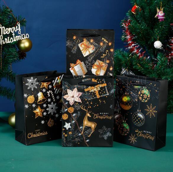 Rectangle 40gsm-150gsm Custom Cardboard Bags Bronzing Christmas Paper Bags With Handles