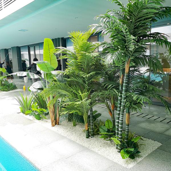 Зеленые в горшке крытые орнаменты места отдыха ландшафта угла ладони путешественников