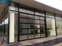 Portes sectionnelles commerciales de panneau en verre en aluminium de cadre pour la salle d'exposition