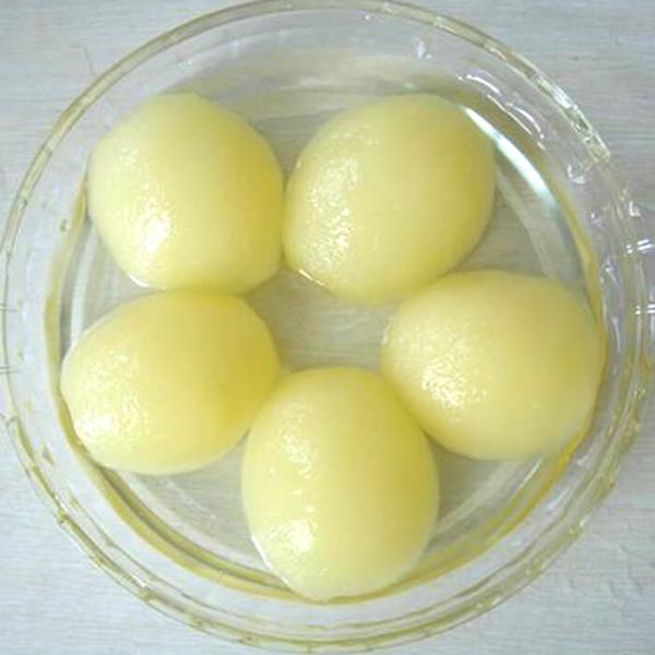 Conserve de fruits organique délicieux, cacher en boîte organique de poires Bartlett diplômée