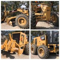 Niveleuse CAT 140K d'occasion, capacité de carburant de 454L, avec lame de 14 pieds