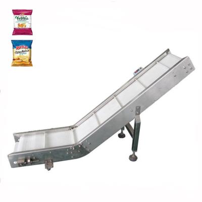 O saco do petisco inclinou sistemas de transporte calçados de produto comestível da correia