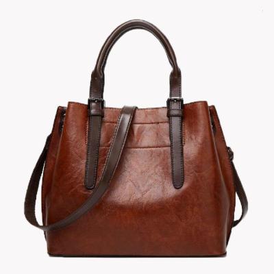 Bolsa de couro retro das únicas senhoras do ombro
