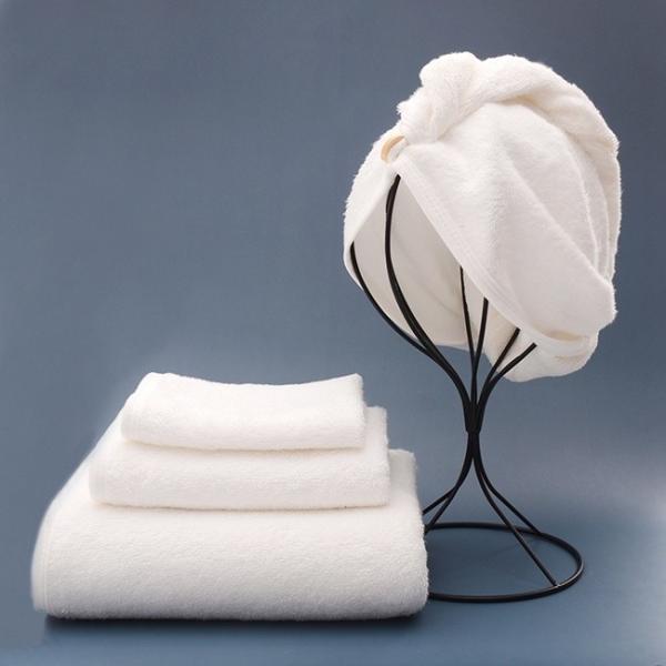 Les serviettes de luxe de collection d'hôtel de Bath de grand coton organique absorbant ont placé 70x140cm