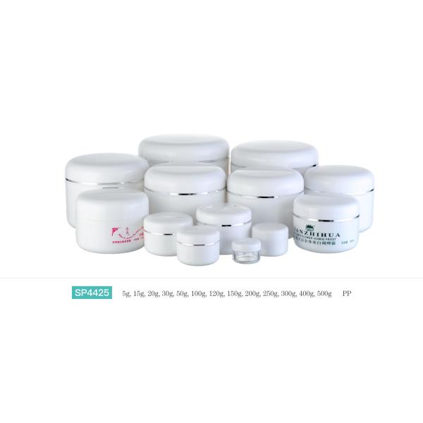 Un récipient cosmétique coloré avec décorations d'impression personnalisées