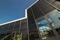 Fabricantes de vidrio solar fotovoltaico a medida Pared de cortina de vidrio generador de energía