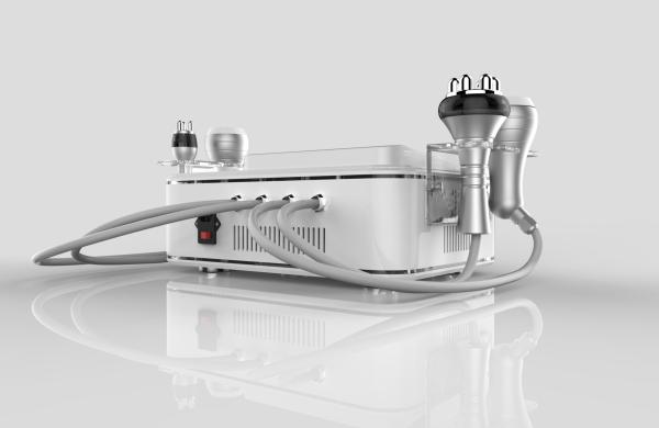 FDA/CE approved 4 handles 100 w 40 K focused cavitation tripolar multipolar bipolar rf machine for beauty spa