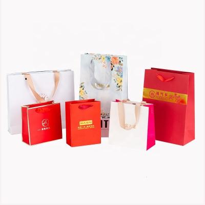 Encomenda personalizada aceitável Logotipo de luxo Impresso Saco de compras para belo presente de férias