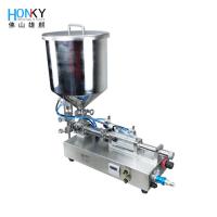 Máquina de llenado de pasta de crema de escritorio con trampolín de calefacción para llenar el material de pasta de crema